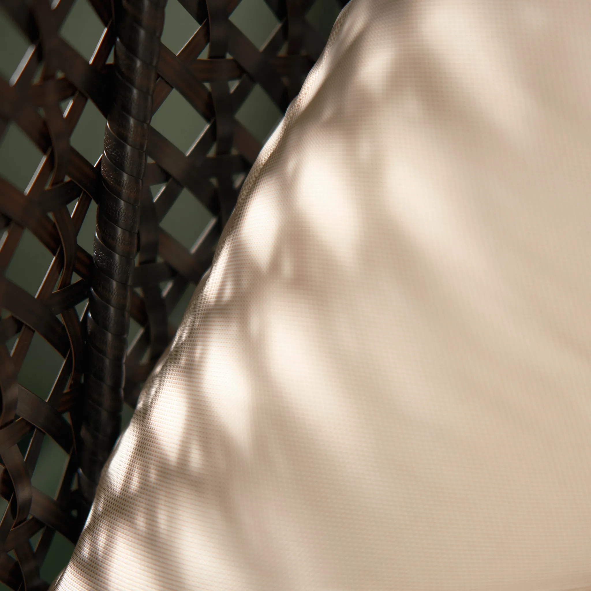 If your photos aren’t good enough... A closeup photo of a chairback casting a patterned shadow on a white pillow